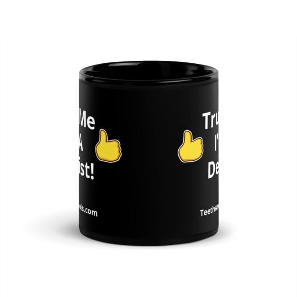 Black mug with the words "Teeth Are Not Tools" on two sides 10oz