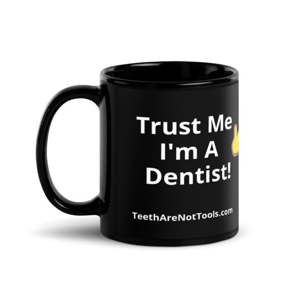 Black mug with the words "Teeth Are Not Tools" on two sides 11 oz